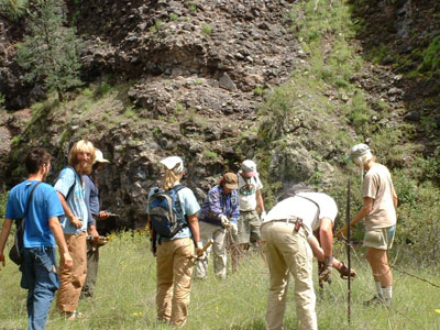 Group at barbed wire fence photo